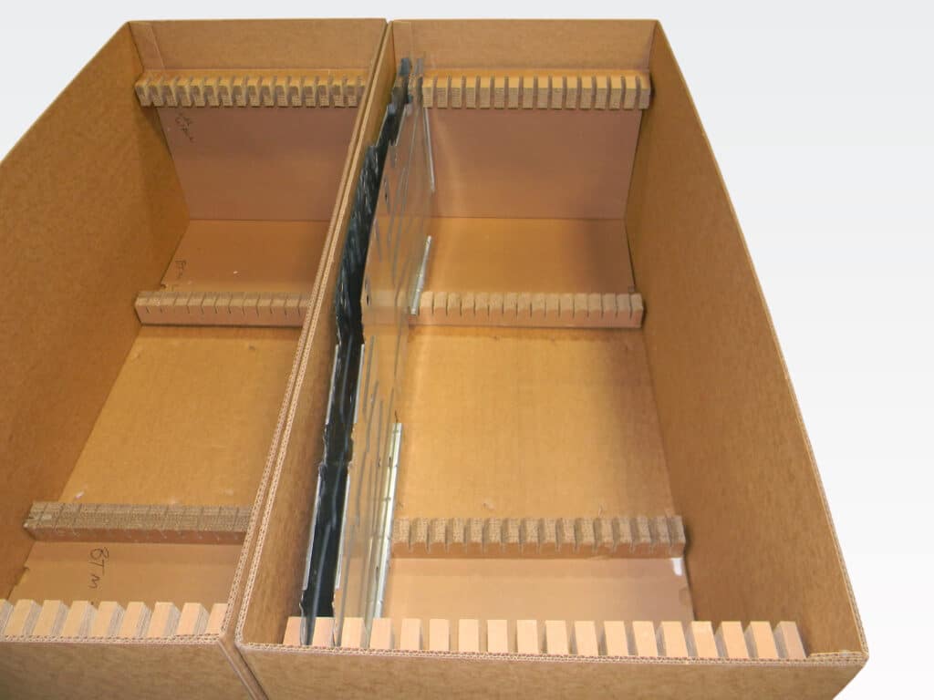Custom cardboard box inserts for secure packaging and organization of items.